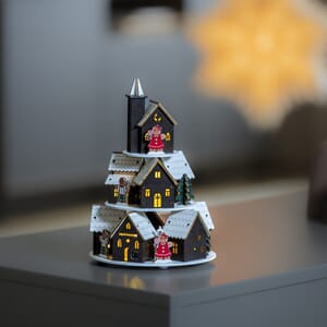 Siluett motiv med hus i pyramideform
