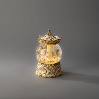 Vannfyllt lykt roterende karusell