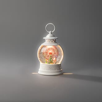 Vannfyllt lykt med pariserhjul og juletre