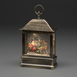 Vannfyllt lykt med glittereffekt nisse med slede