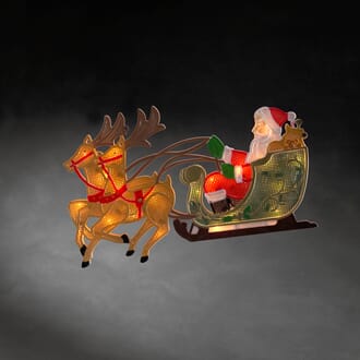 Siluett nisse i slede